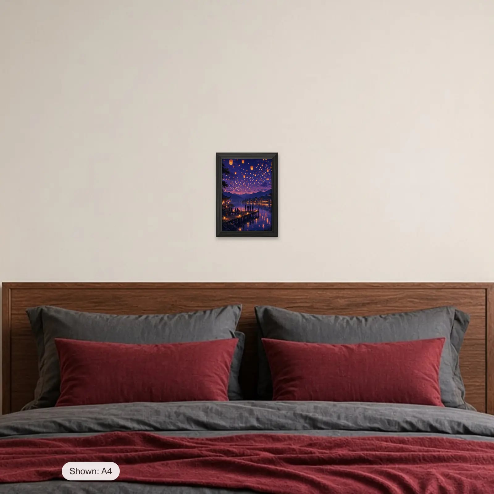 Lantern Festival Art Print above a bed with crimson pillows
