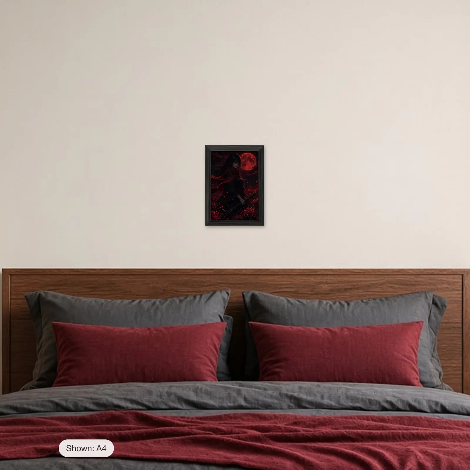 Red Lily Ronin Frame above a bed with crimson pillows