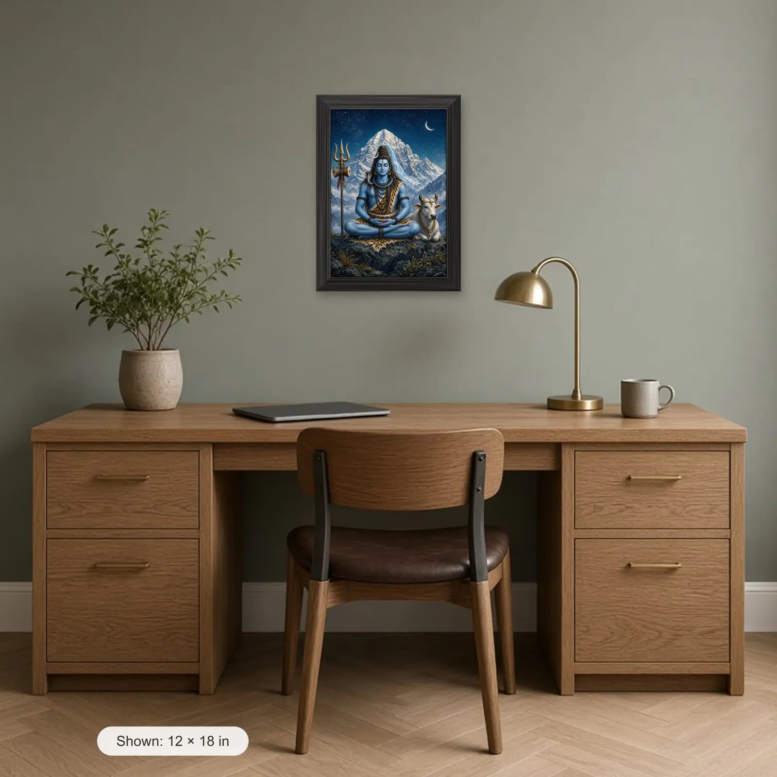 Shiv Ji Frame above a desk