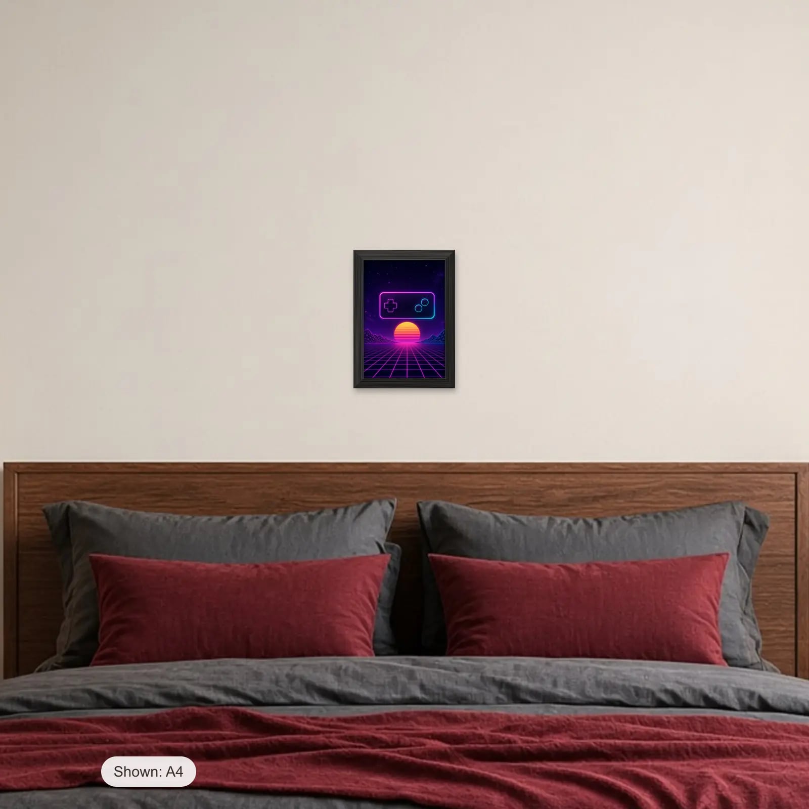 Controller Glow Gaming Frame above a bed with crimson pillows