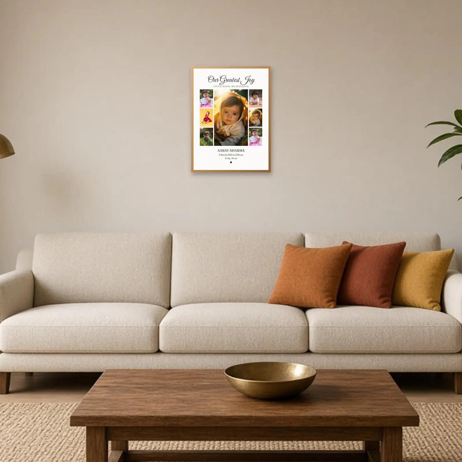 Our Greatest Joy Baby Frame — 7 Photos above a sofa